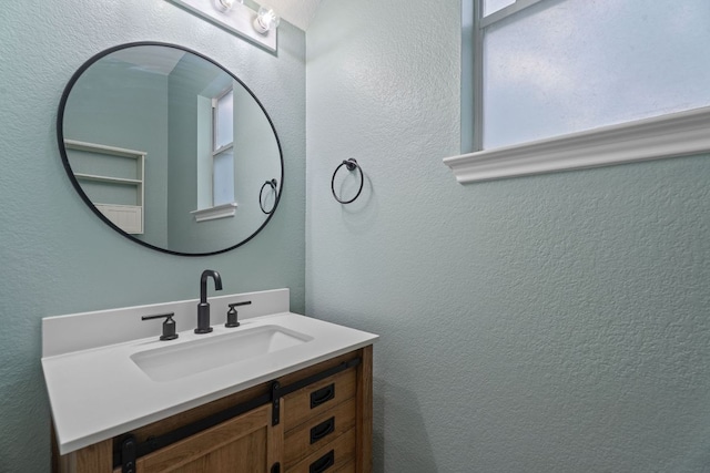 2009 Campfield Pkwy, Austin, TX 78745 - bathroom with vanity and a textured wall