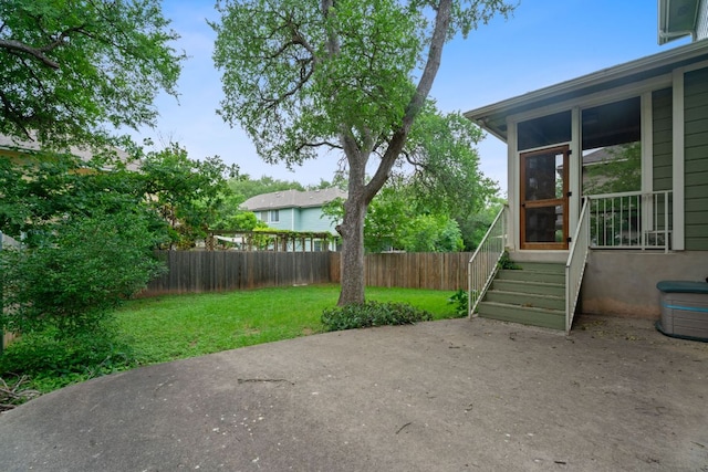 2009 Campfield Pkwy, Austin, TX 78745 - view of yard featuring a patio area and a sunroom