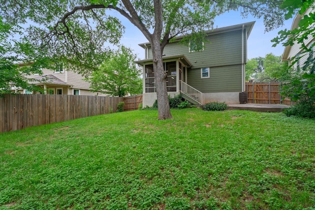 2009 Campfield Pkwy, Austin, TX 78745 - rear view of property with a sunroom and a patio area