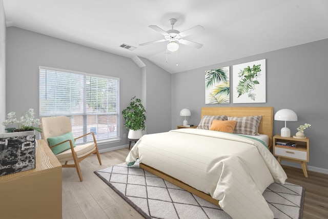 2009 Campfield Pkwy, Austin, TX 78745 - bedroom featuring lofted ceiling, light wood-style flooring, baseboards, and ceiling fan