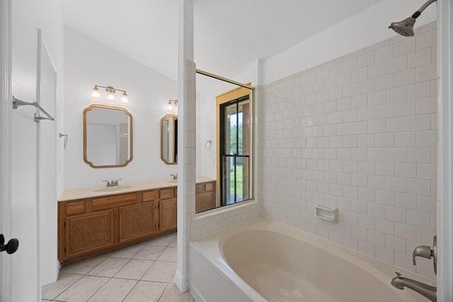 16202 Kicking Bird Dr, Leander, TX 78641 - bathroom featuring a bathtub, tile patterned floors, vanity, and a shower