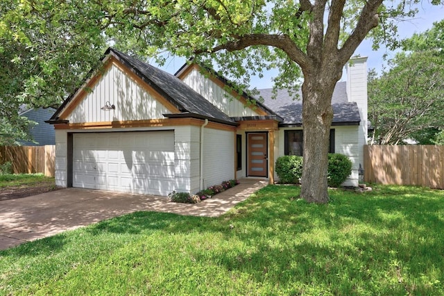 16202 Kicking Bird Dr, Leander, TX 78641 - view of front of property with a chimney, a garage, and a shingled roof
