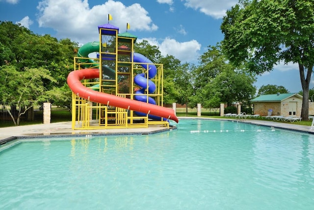 16202 Kicking Bird Dr, Leander, TX 78641 - community pool with a water slide