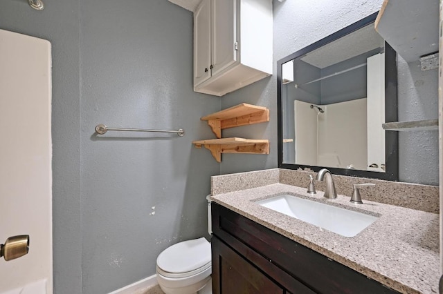 6212 Boxcar Run, Austin, TX 78745 - full bath with toilet, vanity, a shower, and baseboards