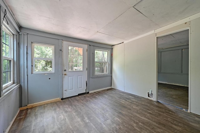 6212 Boxcar Run, Austin, TX 78745 - doorway with wood finished floors and plenty of natural light