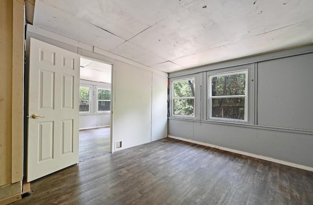 6212 Boxcar Run, Austin, TX 78745 - spare room featuring dark wood finished floors