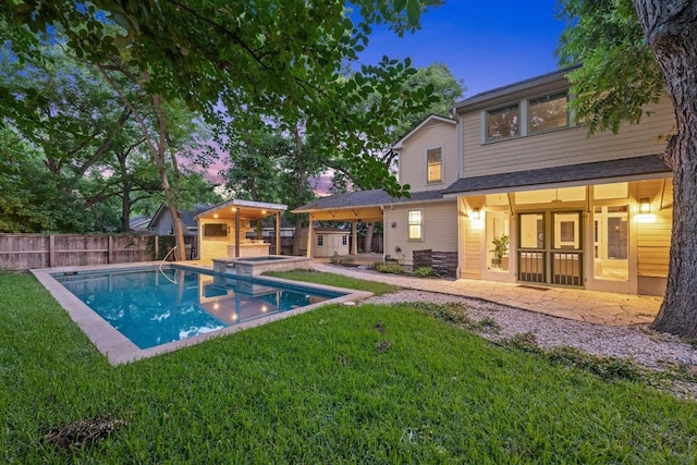 4517 Ave G, Austin, TX 78751 - view of pool with a patio area, a fenced backyard, and a pool with connected hot tub