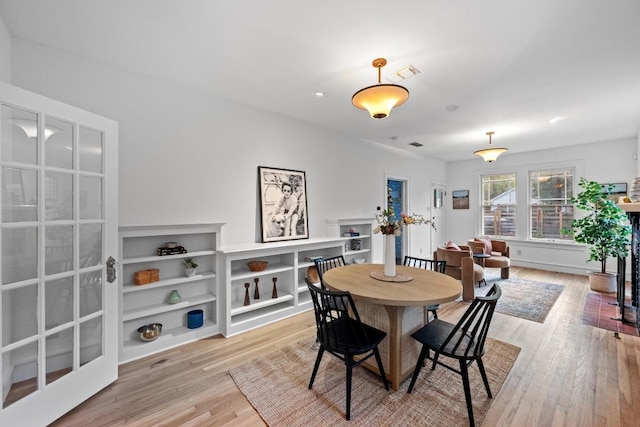 4517 Ave G, Austin, TX 78751 - dining room with light wood-type flooring
