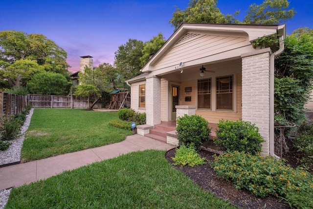 4517 Ave G, Austin, TX 78751 - view of front of home featuring a ceiling fan and brick siding