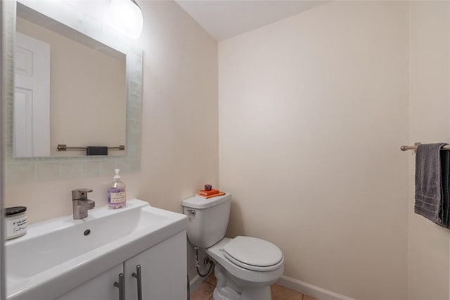 5616 Emerald Forest Dr Unit 111, Austin, TX 78745 - bathroom featuring vanity, toilet, baseboards, and tile patterned flooring