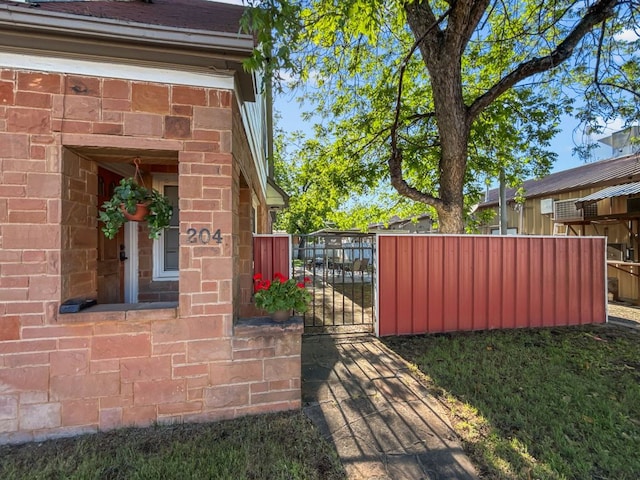 206 S Clear St, San Saba, TX 76877 - view of property exterior with a gate
