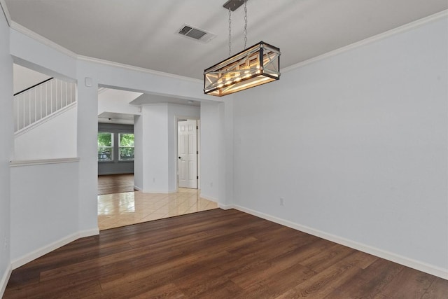 4424 Campo Verde Dr, Austin, TX 78749 - unfurnished dining area featuring ornamental molding, wood finished floors, baseboards, and stairs