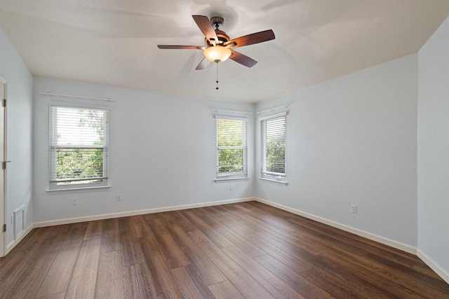 4424 Campo Verde Dr, Austin, TX 78749 - unfurnished room with dark wood-type flooring, ceiling fan, and baseboards