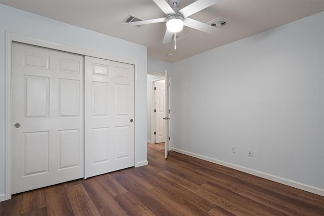 4424 Campo Verde Dr, Austin, TX 78749 - unfurnished bedroom with baseboards, dark wood finished floors, a closet, and ceiling fan
