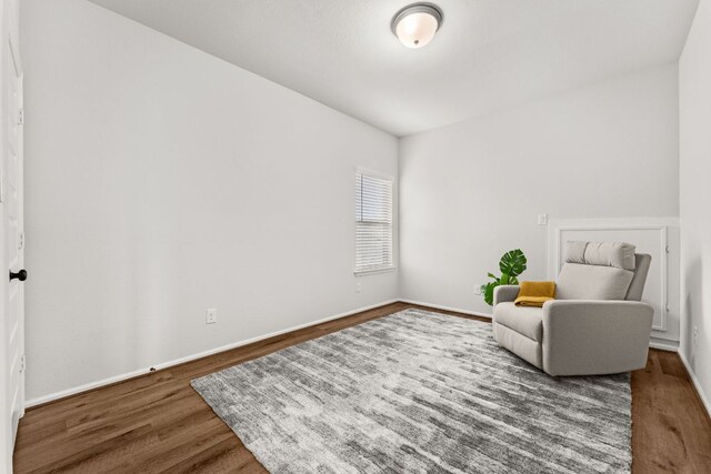 170 Fawn River Run, Kyle, TX 78640 - living area with wood finished floors and baseboards