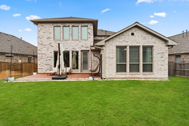 170 Fawn River Run, Kyle, TX 78640 - rear view of property featuring a patio area and brick siding