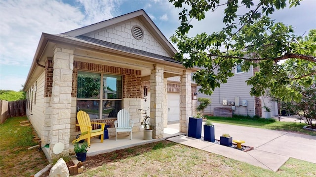 11405 Kirkland Hill Path, Austin, TX 78754 - view of outdoor structure featuring an attached garage and concrete driveway