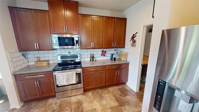 11405 Kirkland Hill Path, Austin, TX 78754 - kitchen with stainless steel appliances, tasteful backsplash, brown cabinets, and light countertops
