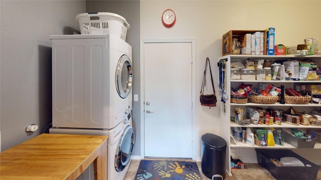11405 Kirkland Hill Path, Austin, TX 78754 - laundry room featuring stacked washer / drying machine