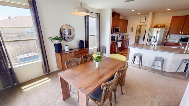 11405 Kirkland Hill Path, Austin, TX 78754 - dining area with light carpet and recessed lighting