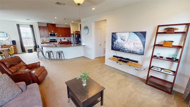 11405 Kirkland Hill Path, Austin, TX 78754 - living room featuring light colored carpet, recessed lighting, and a ceiling fan