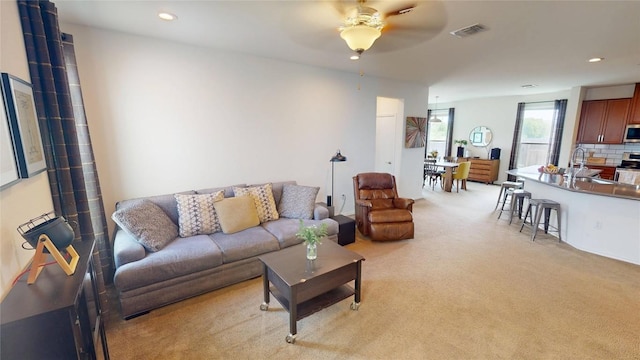 11405 Kirkland Hill Path, Austin, TX 78754 - living area with a ceiling fan, recessed lighting, and light carpet