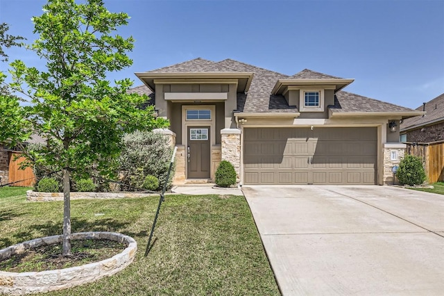 3256 Pablo Cir, Round Rock, TX 78665 - prairie-style home with stucco siding, a garage, concrete driveway, stone siding, and a shingled roof