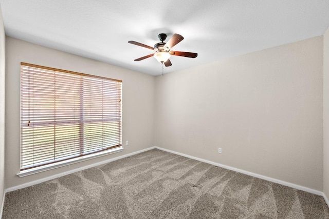 106 Guadalupe Dr, Hutto, TX 78634 - empty room featuring carpet flooring, ceiling fan, and baseboards