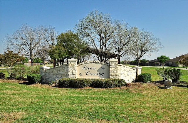 106 Guadalupe Dr, Hutto, TX 78634 - community sign with a lawn