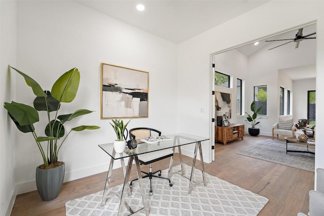 2303 Westworth Cir, Austin, TX 78704 - home office with baseboards, wood finished floors, recessed lighting, and vaulted ceiling