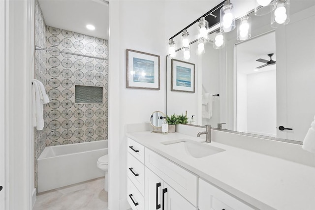 2303 Westworth Cir, Austin, TX 78704 - bathroom with vanity, toilet, shower / bathtub combination, and ceiling fan