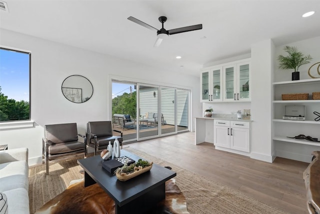 2303 Westworth Cir, Austin, TX 78704 - living room with ceiling fan, light wood-style flooring, and recessed lighting