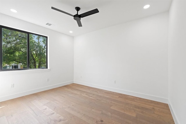 2303 Westworth Cir, Austin, TX 78704 - empty room with a ceiling fan, wood finished floors, baseboards, and recessed lighting