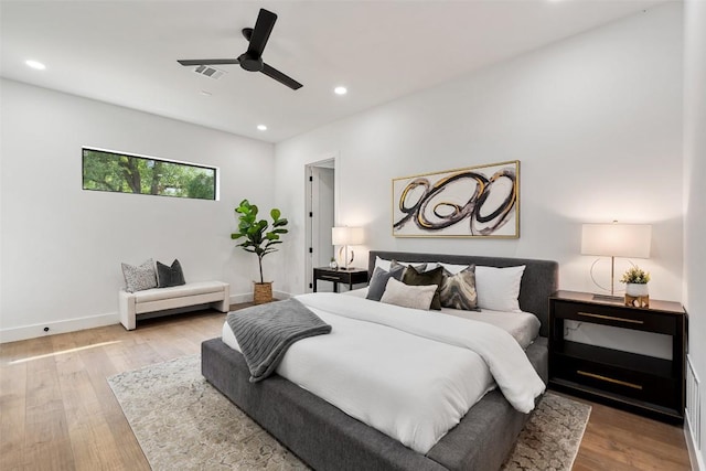 2303 Westworth Cir, Austin, TX 78704 - bedroom with wood finished floors, recessed lighting, baseboards, and a ceiling fan
