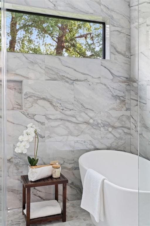 2303 Westworth Cir, Austin, TX 78704 - bathroom featuring a freestanding tub