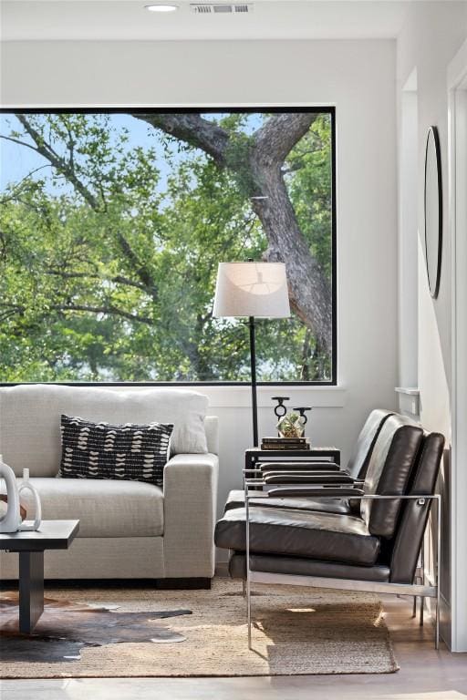 2303 Westworth Cir, Austin, TX 78704 - sitting room with wood finished floors