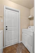 205 W Little Dipper Dr, Killeen, TX 76542 - laundry room with washer and dryer and baseboards