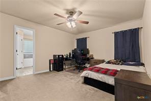 205 W Little Dipper Dr, Killeen, TX 76542 - bedroom with baseboards, carpet, a ceiling fan, and ensuite bathroom