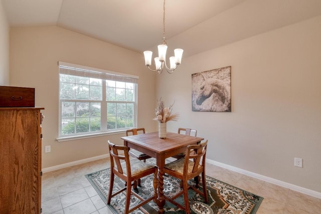 11404 Day Camp Ln, Austin, TX 78754 - dining area with lofted ceiling, a chandelier, light tile patterned floors, and baseboards