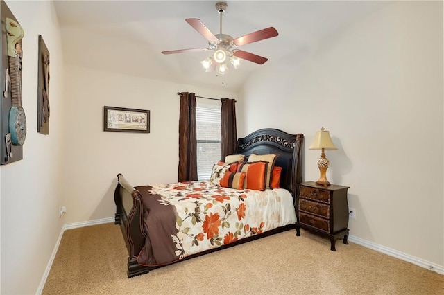 2002 S Ash Cv, Hutto, TX 78634 - carpeted bedroom with baseboards, vaulted ceiling, and ceiling fan