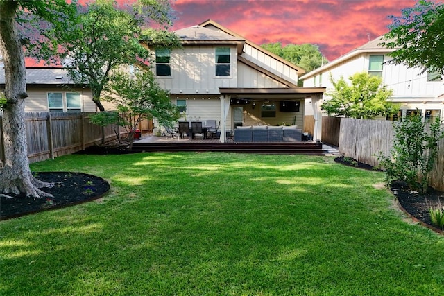 7709 Menchaca Rd Unit 16, Austin, TX 78745 - back of house at dusk featuring an outdoor living space, a deck, and board and batten siding