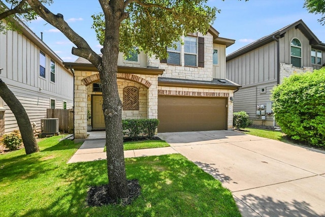 7709 Menchaca Rd Unit 16, Austin, TX 78745 - multi unit property with stone siding, an attached garage, concrete driveway, and cooling unit