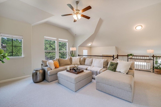 7709 Menchaca Rd Unit 16, Austin, TX 78745 - living room featuring a ceiling fan, carpet, lofted ceiling, and baseboards
