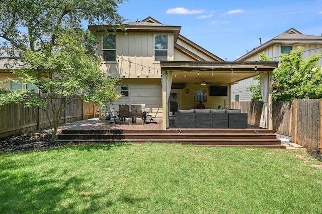 7709 Menchaca Rd Unit 16, Austin, TX 78745 - back of property featuring an outdoor living space, a deck, a ceiling fan, board and batten siding, and outdoor dining space