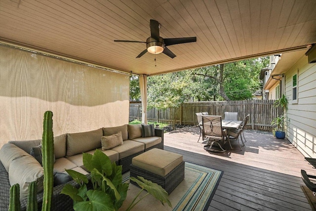 7709 Menchaca Rd Unit 16, Austin, TX 78745 - wooden terrace with an outdoor hangout area, outdoor dining space, a fenced backyard, and a ceiling fan