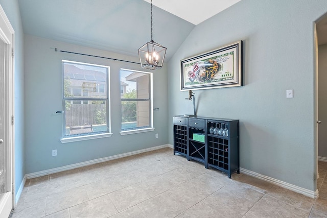 3217 Falconers Way, Pflugerville, TX 78660 - dining area with a chandelier, light tile patterned floors, baseboards, and vaulted ceiling