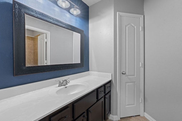 3217 Falconers Way, Pflugerville, TX 78660 - bathroom with vanity and baseboards
