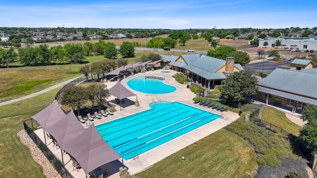 3217 Falconers Way, Pflugerville, TX 78660 - community pool featuring a patio