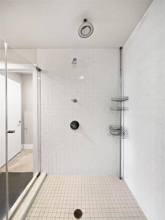603 Davis St Unit 1108, Austin, TX 78701 - bathroom featuring a stall shower