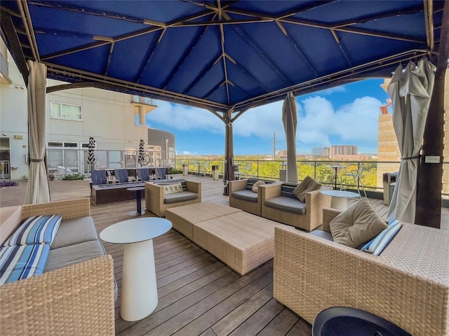 603 Davis St Unit 1108, Austin, TX 78701 - wooden deck with outdoor lounge area